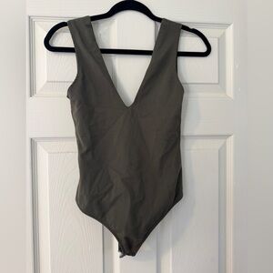 Like new intimately free people Olive Green body suit sz XS